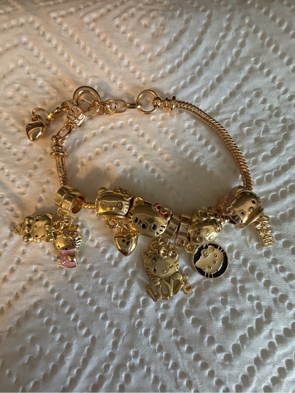 Sanrio Hello Kitty Gold and Pink Charm Bracelet - Picture 1 of 4